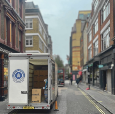 Vantastic Removals efficiently loading a moving van on a bustling London street, showcasing our expertise in urban moves.
